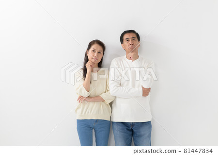 Senior couple thinking worried Senior couple thinking worried 81447834