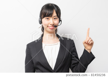 Female operator with headset Female operator with headset 81450236