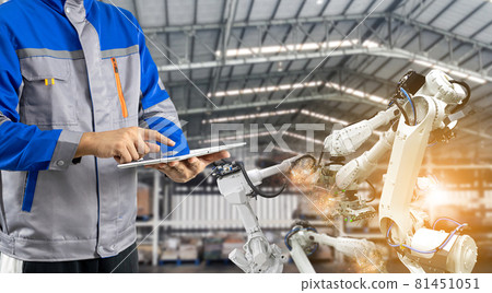 Industrial machine operator, robotic arm in the factory 81451051