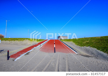 Blue sky and red road 81457317