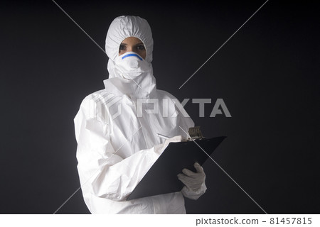 medical woman equipated for virus or nuclear alarm 81457815