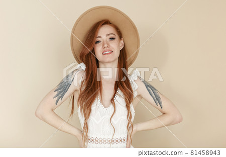 Cheerful woman with ginger hair Cheerful woman with ginger hair 81458943