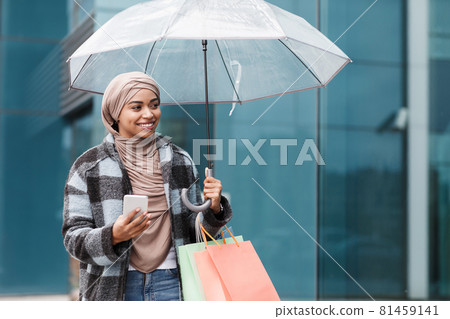 Satisfied buyer, online ordering, cashback and mobile app, social distance and shopping outdoo Satisfied buyer, online ordering, cashback and mobile app, social distance and shopping outdoo 81459141