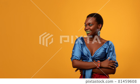 Stylish afro american young woman looking at copy space Stylish afro american young woman looking at copy space 81459608