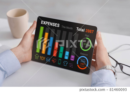 Cropped of businessman checking family expenses, using digital tablet Cropped of businessman checking family expenses, using digital tablet 81460093