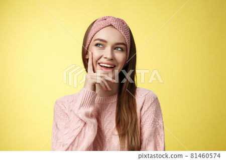 Girl having great idea, smirking delighted, proud herself, touching cheek smiling amused creating plan in mind looking at upper left corner pleased, intrigued and excited seeing awesome opportunity Girl having great idea, smirking delighted, proud herself, touching cheek smiling amused creating plan in mind looking at upper left corner pleased, intrigued and excited seeing awesome opportunity 81460574