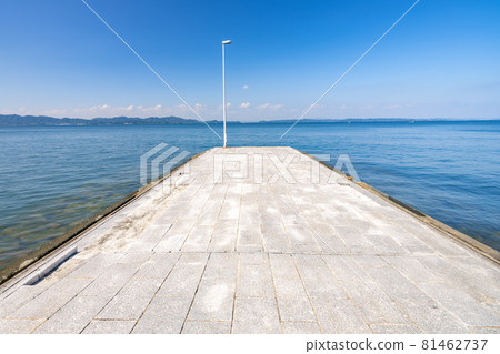 [Summer] Scenery of the blue sea and sunny sky seen from the breakwater Teshima, Kagawa Prefecture 81462737