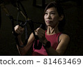Fit Asian Woman Exercising At the Gym 81463469