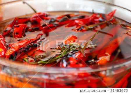 red pickled peppers at a street food festival red pickled peppers at a street food festival 81463673