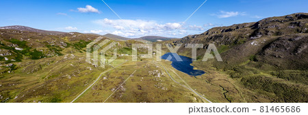 The road to An Port between Ardara and Glencolumbkille in County Donegal - Ireland. 81465686