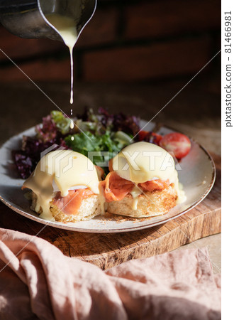 Eggs Benedict with smoked salmon, Hollandise Eggs Benedict with smoked salmon, Hollandise 81466981