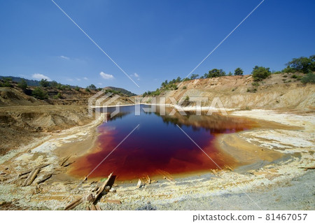 Red Lake in Cyprus Mitsero Sha Mine Landscape with blue sky 81467057