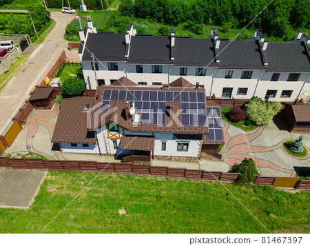 aerial view of house building with solar sun panels 81467397