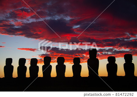 Dramatic colorful sunrise over Moai stone sculptures at Ahu Tongariki, Easter island, Chile. Dramatic colorful sunrise over Moai stone sculptures at Ahu Tongariki, Easter island, Chile. 81472292
