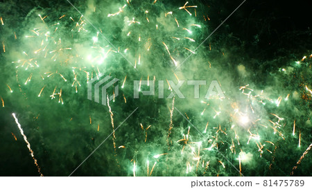 Green Firework celebrate anniversary happy new year 2022, 4th of july holiday festival. Green firework in night time celebrate national holiday. Countdown to new year 2022 festival party time event Green Firework celebrate anniversary happy new year 2022, 4th of july holiday festival. Green firework in night time celebrate national holiday. Countdown to new year 2022 festival party time event 81475789