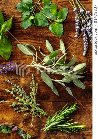 Aromatic herbs, shot from above on a rustic wooden background 81478837