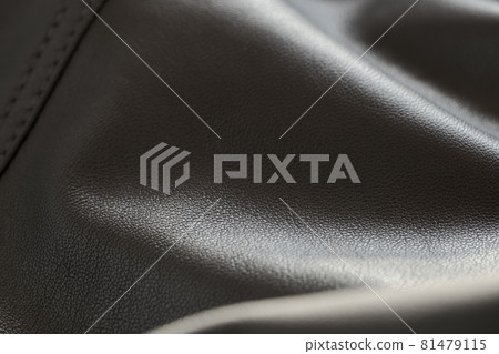 Detail shot of supple leather jacket with stitching 81479115