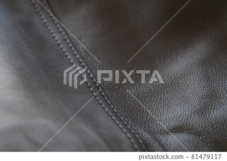 Detail shot of supple leather jacket with stitching 81479117