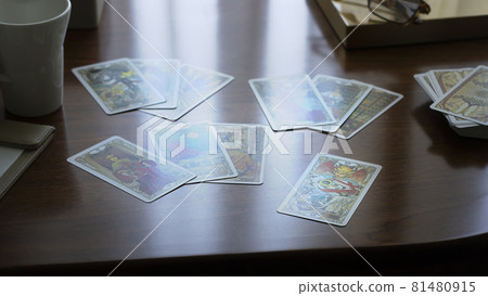 Gold tarot cards on the table, esoteric concept, fortune telling and predictions 81480915