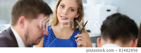 Group of men and women discussing in office 81482956