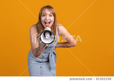 Horizontal portrait of young Caucasian girl isolated on yellow studio background. Concept of human emotions, facial expression, youth, sales, ad. Horizontal portrait of young Caucasian girl isolated on yellow studio background. Concept of human emotions, facial expression, youth, sales, ad. 81483298