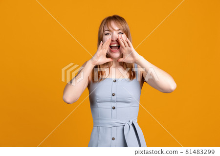 Horizontal portrait of young Caucasian girl isolated on yellow studio background. Concept of human emotions, facial expression, youth, sales, ad. Horizontal portrait of young Caucasian girl isolated on yellow studio background. Concept of human emotions, facial expression, youth, sales, ad. 81483299