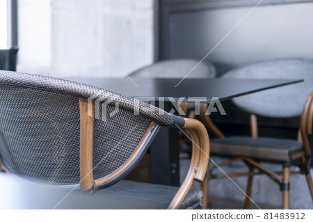 A cozy place for business negotiations in a cafe with elegant chairs with a wooden light curved frame. City restaurant decorations A cozy place for business negotiations in a cafe with elegant chairs with a wooden light curved frame. City restaurant decorations 81483912