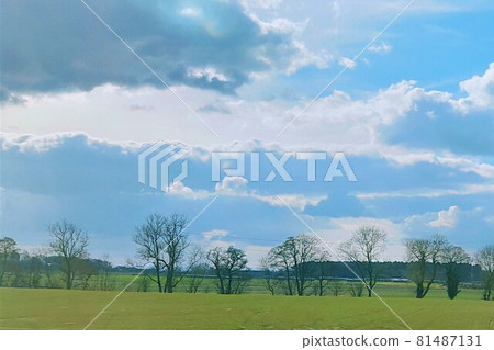 Rural England spreading under the sky and white clouds 81487131