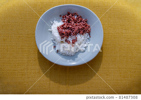 Riceberry and Jasmine rice in white plate. Healthy food and diet concept. 81487308