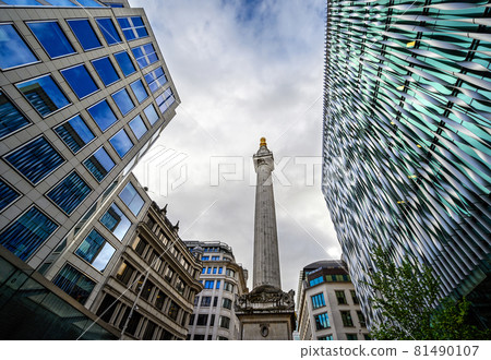The Monument to the Great Fire of London, usually called simply The Monument, is a Doric column located in the City of London, UK. The Monument is now surrounded by the modern architecture of London. 81490107