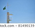 Lifeguard without a lifeguard and with a green flag on a quiet beach with the sea in the background and a sunny day 81490139