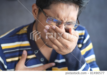 Sick man got flu allergy sneezing and blowing nose 81490577