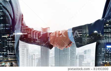 Close-up of the handshake of businessmen. Close-up of the handshake of businessmen. 81491000