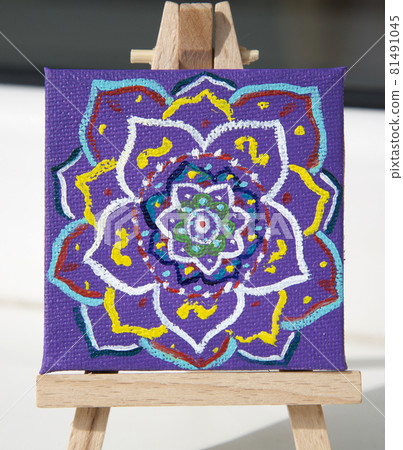 Mandala painted with multi-colored oil paints on canvas Mandala painted with multi-colored oil paints on canvas 81491045