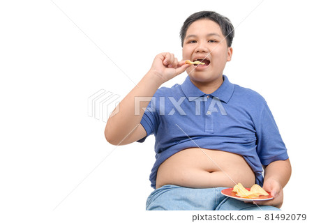 Obese fat boy eating potato chips isolated on white background, Obese fat boy eating potato chips isolated on white background, 81492079