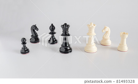 Black and white chess battle on white ,Chess victory,business concept. Black and white chess battle on white ,Chess victory,business concept. 81493328