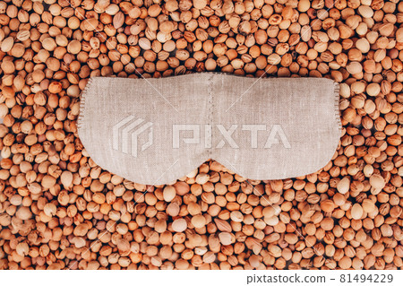 Cherry stone fabric pillow for eye massage, cherry pit filled eye pillow - natural heat or cool pack. Alternative medicine and therapy, pit sack for chiropractic care and autistic kids. Copy space Cherry stone fabric pillow for eye massage, cherry pit filled eye pillow - natural heat or cool pack. Alternative medicine and therapy, pit sack for chiropractic care and autistic kids. Copy space 81494229