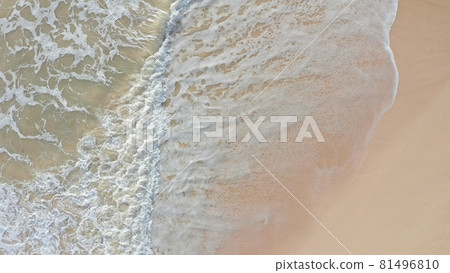 Aerial view from above down Drone shot. Beautiful tropical beach sea with white sand. Top view. Empty and clean beach in summer season on Oahu Hawaii Island. 81496810