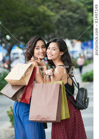 Beautiful Women with many Shopping Bags Beautiful Women with many Shopping Bags 81497149