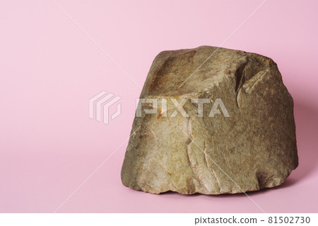 Creative stone podium for cosmetics or products on pink background. Marketing scene mockup 81502730