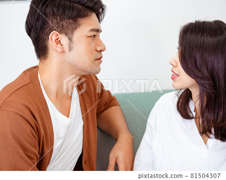 Asian young woman and Asian young man have differences in opinion discussion and are communicating. Asian young woman and Asian young man have differences in opinion discussion and are communicating. 81504307