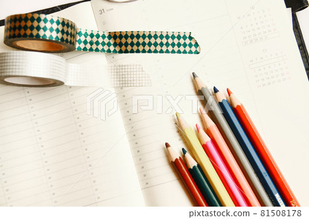 Schedule book, colored pencils and masking tape 81508178