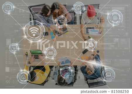 Technology digital virtual screen and Wireless communication connecting over Top view scene of Asian and Multiethnic Business people with casual suit working and hand shaking in the modern workplace Technology digital virtual screen and Wireless communication connecting over Top view scene of Asian and Multiethnic Business people with casual suit working and hand shaking in the modern workplace 81508250