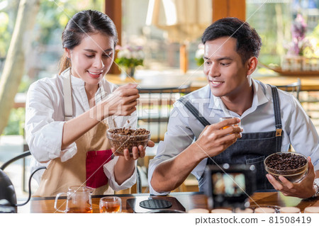 Asian two partner of small business owner showing and presenting the how to making coffee by drip method, entrepreneur blogger and startup business concept Asian two partner of small business owner showing and presenting the how to making coffee by drip method, entrepreneur blogger and startup business concept 81508419