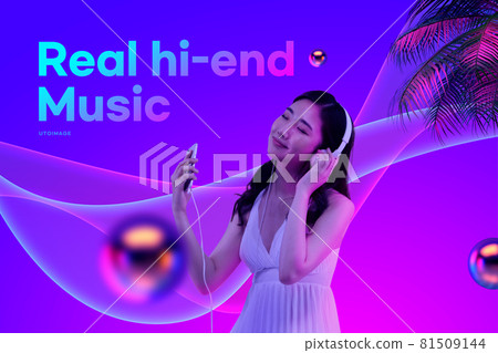 Asian model with headphones listening to real high end music 81509144