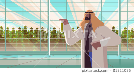 agricultural engineer holding test tube with chemicals arab man farmer researching plants in greenhouse 81511056