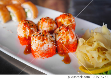 Japanese traditional baked roll with fish and sauce. sushi rolls California Japanese traditional baked roll with fish and sauce. sushi rolls California 81513732