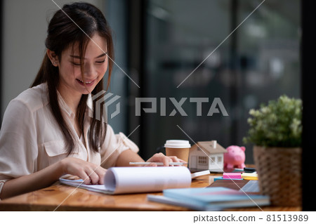 Portrait asian businesswoman or lawyer accountant working financial investment on office, using calculator analysis finance document report real estate and home loan insurance Portrait asian businesswoman or lawyer accountant working financial investment on office, using calculator analysis finance document report real estate and home loan insurance 81513989