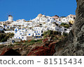 Three girls staring at the future swaying over the Aegean Sea from Santorini 81515434