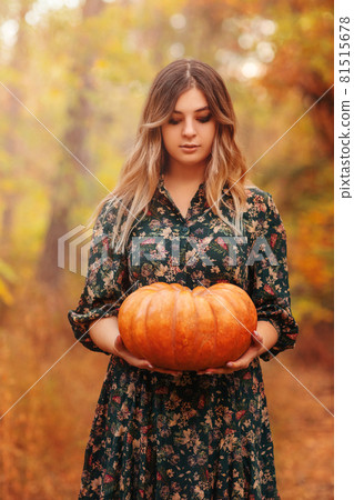 Portrait of young brunette girl with long straight hair and dark vamp makeup Portrait of young brunette girl with long straight hair and dark vamp makeup 81515678